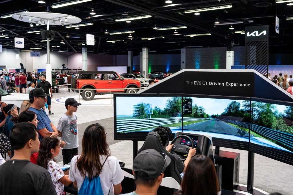 auto show attendees on convention center carpet